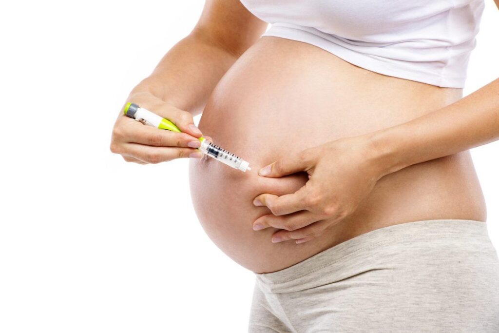 Pregnant woman with Type 1 diabetes using insulin during pregnancy